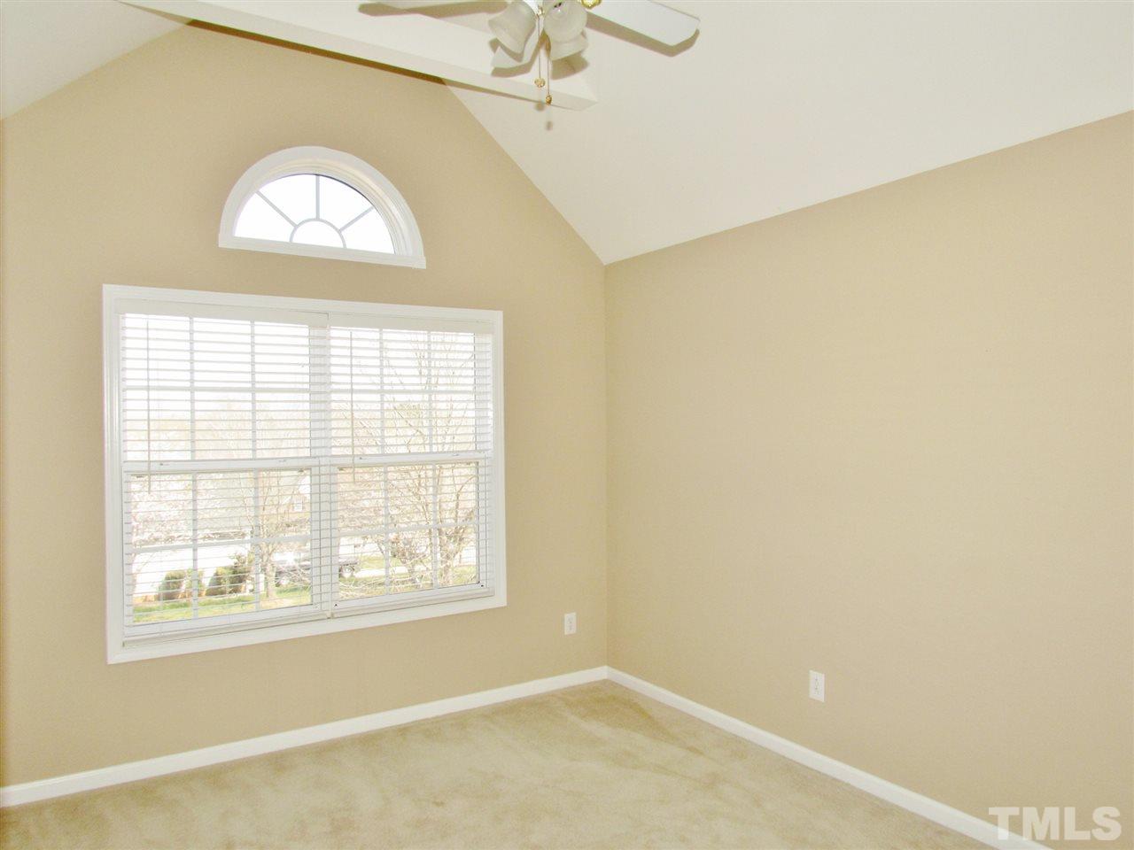 101 Mickleson Ridge Drive Raleigh, NC 27603 - Photo 17 of 25 an empty room with a window