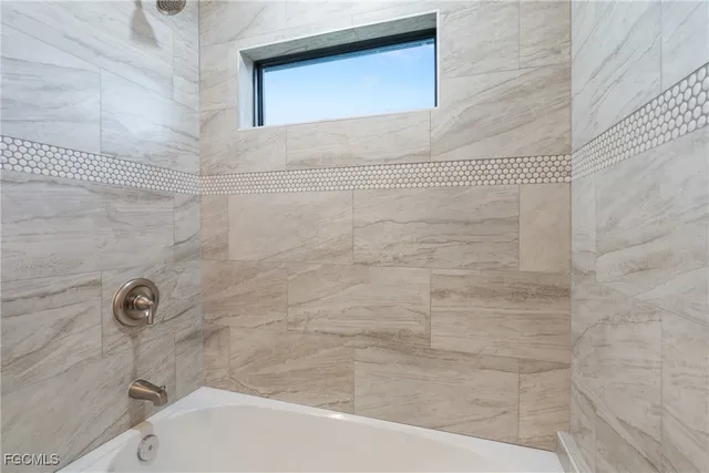 a bathroom with a bathtub