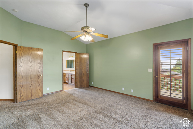 1373 Pheasant Ridge Circle Bountiful, UT 84010 - Photo 19 of 50 Primary bedroom with Vaulted ceiling with a ceiling fan, carpeted flooring, and a glass-paneled door to an exterior balcony