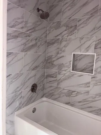 a bathroom with a bathtub