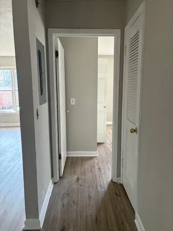 a view of hallway with walk in closet