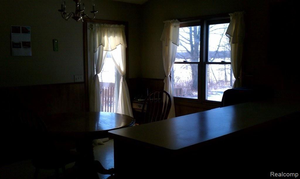 2229 Fowlerville Road Fowlerville, MI 48836 - Photo 5 of 12 DOOR LEADS TO OUTSIDE DECK