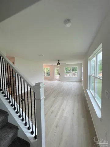 a view of entryway with wooden floor