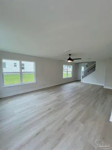 a view of an empty room with window