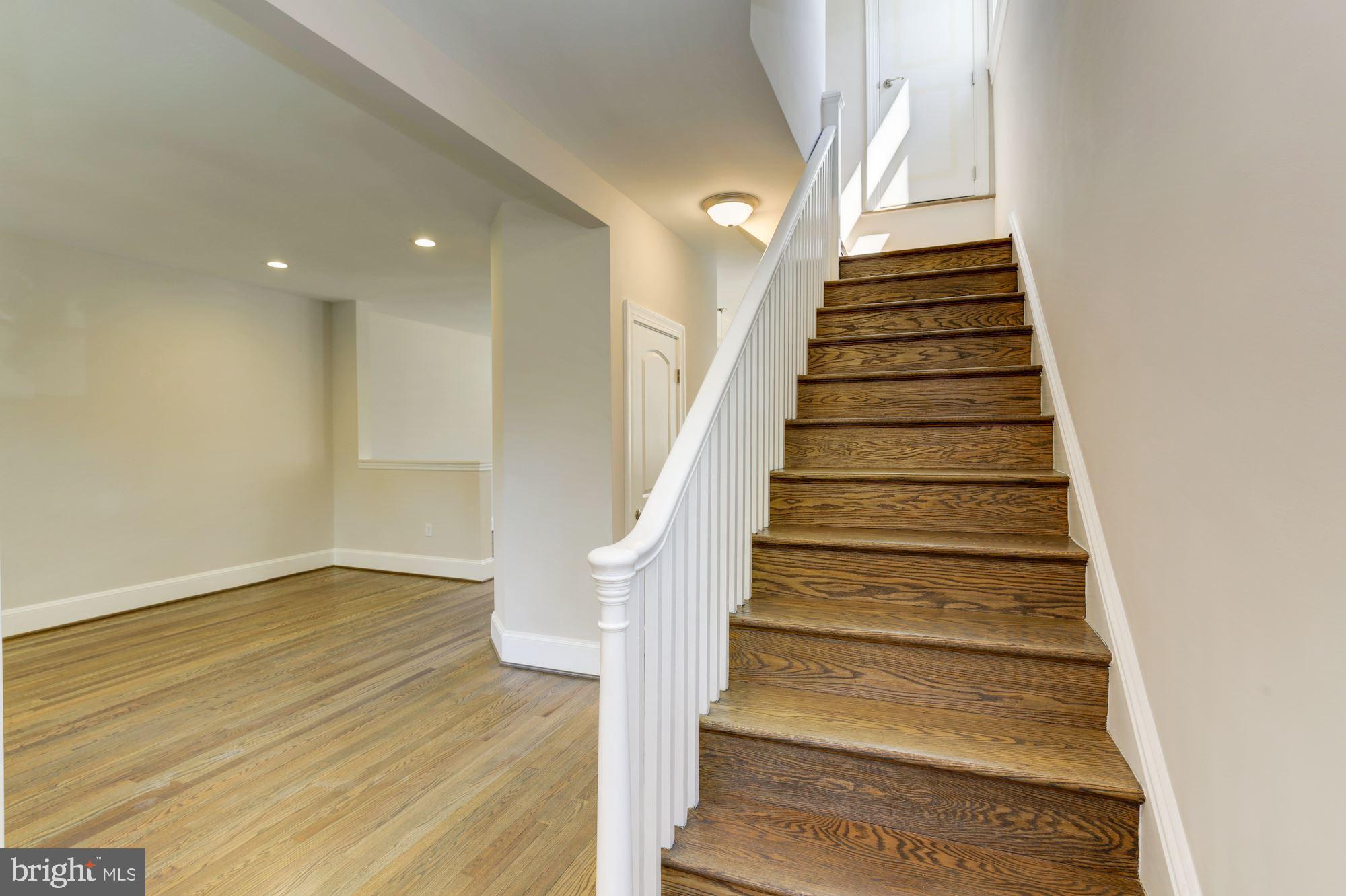 406 Hopkins Road Baltimore, MD 21212 - Photo 11 of 52 Living room entry widened