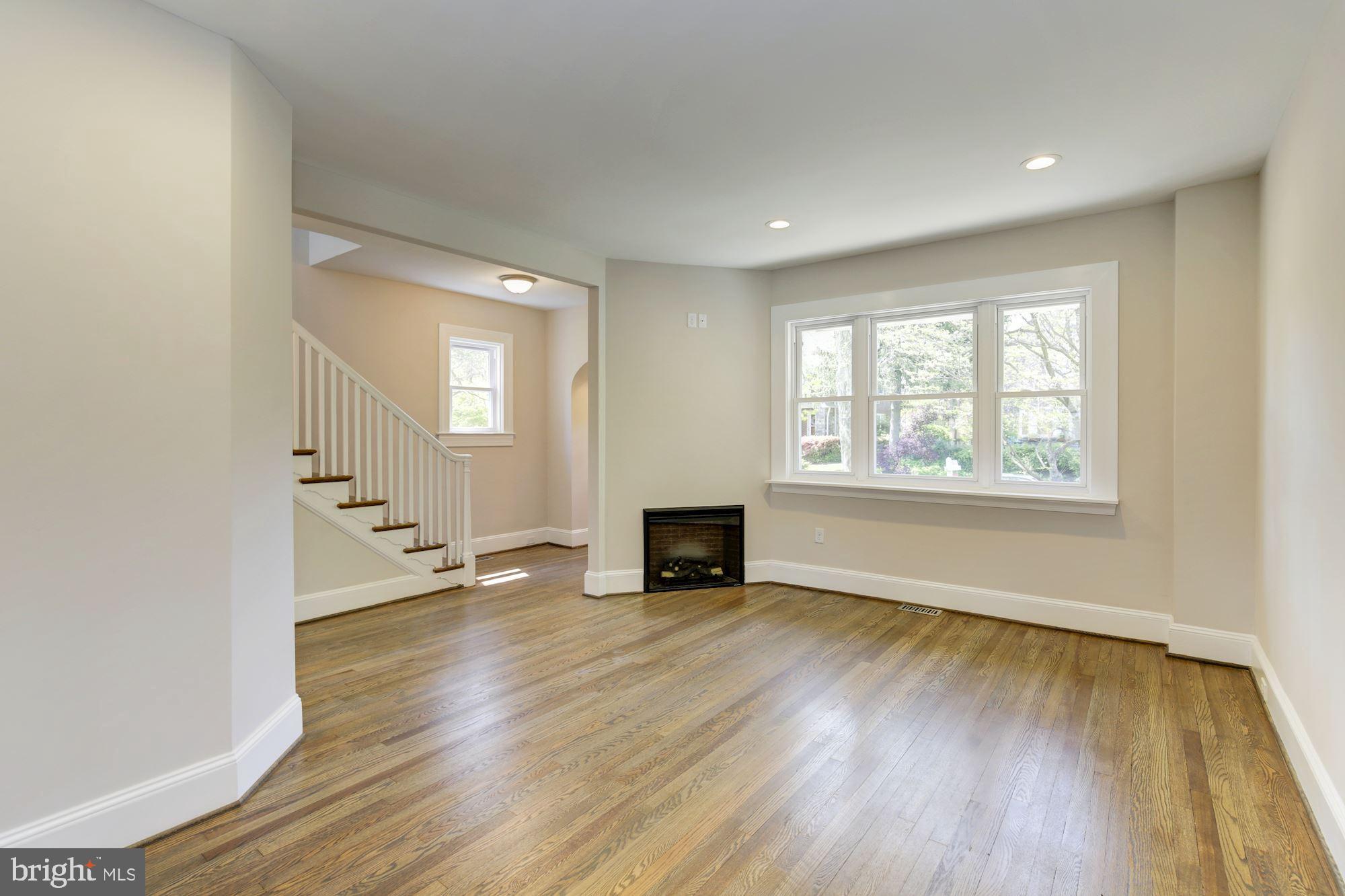 406 Hopkins Road Baltimore, MD 21212 - Photo 13 of 52 New gas fireplace added. New windows