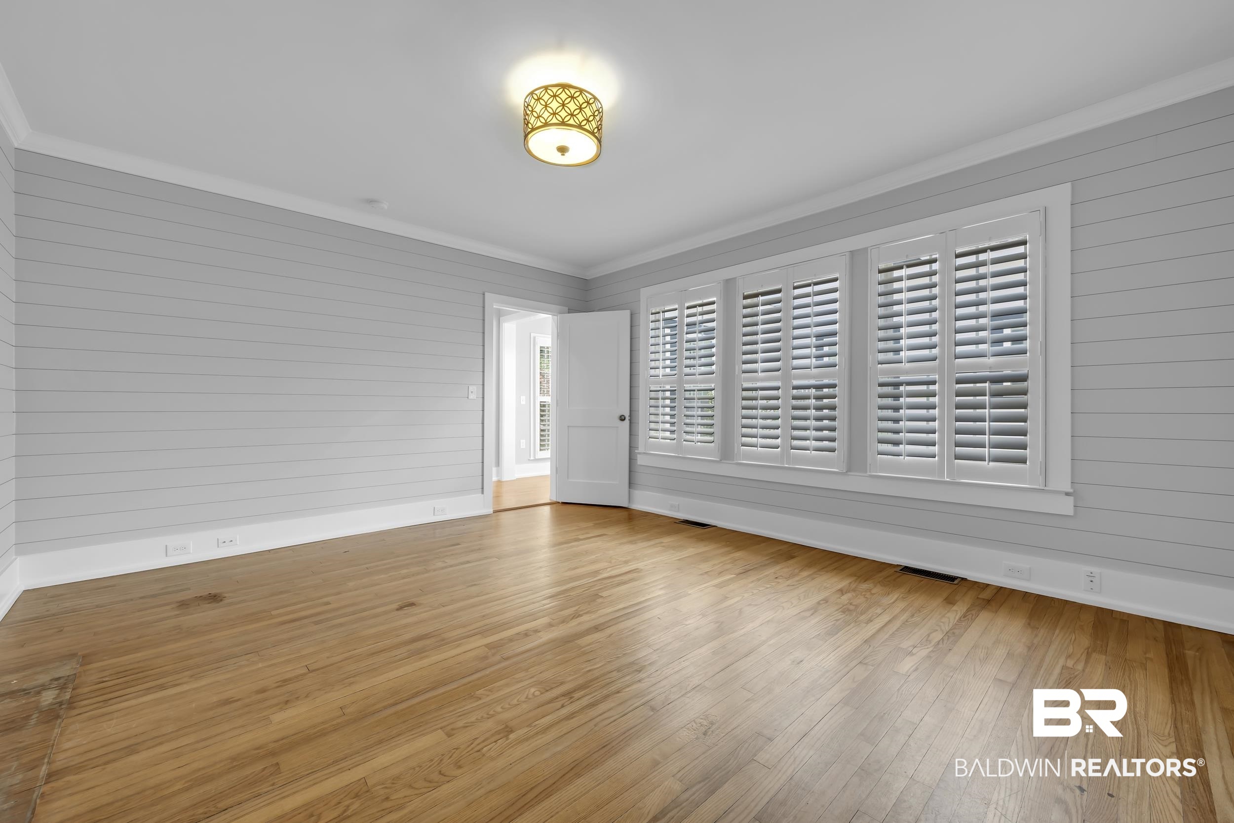 43199 Pine Grove Road Bay Minette, AL 36507 - Photo 55 of 71 Hardwood flooring complemented by shiplap accent walls