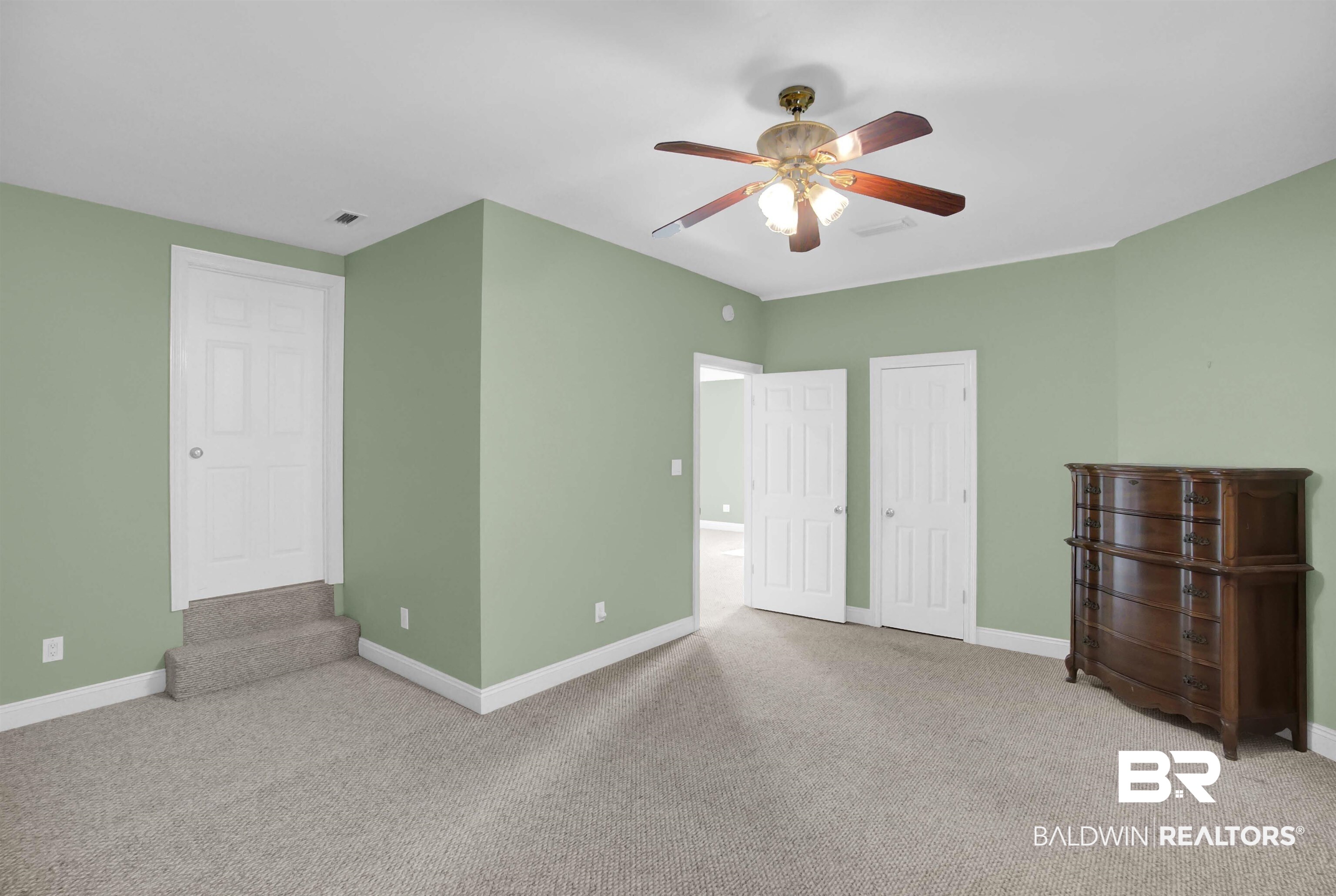 27688 Rigsby Road Daphne, AL 36526 - Photo 45 of 56 Carpeted spare room featuring ceiling fan