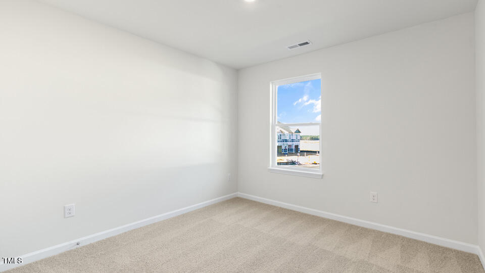 32 Red Clover Drive Angier, NC 27501 - Photo 20 of 38 a view of an empty room with a window