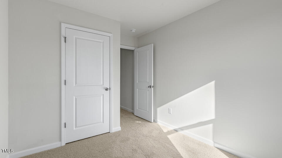 32 Red Clover Drive Angier, NC 27501 - Photo 23 of 38 a view of an empty room