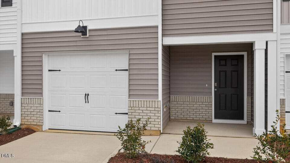32 Red Clover Drive Angier, NC 27501 - Photo 5 of 38 a front view of a house