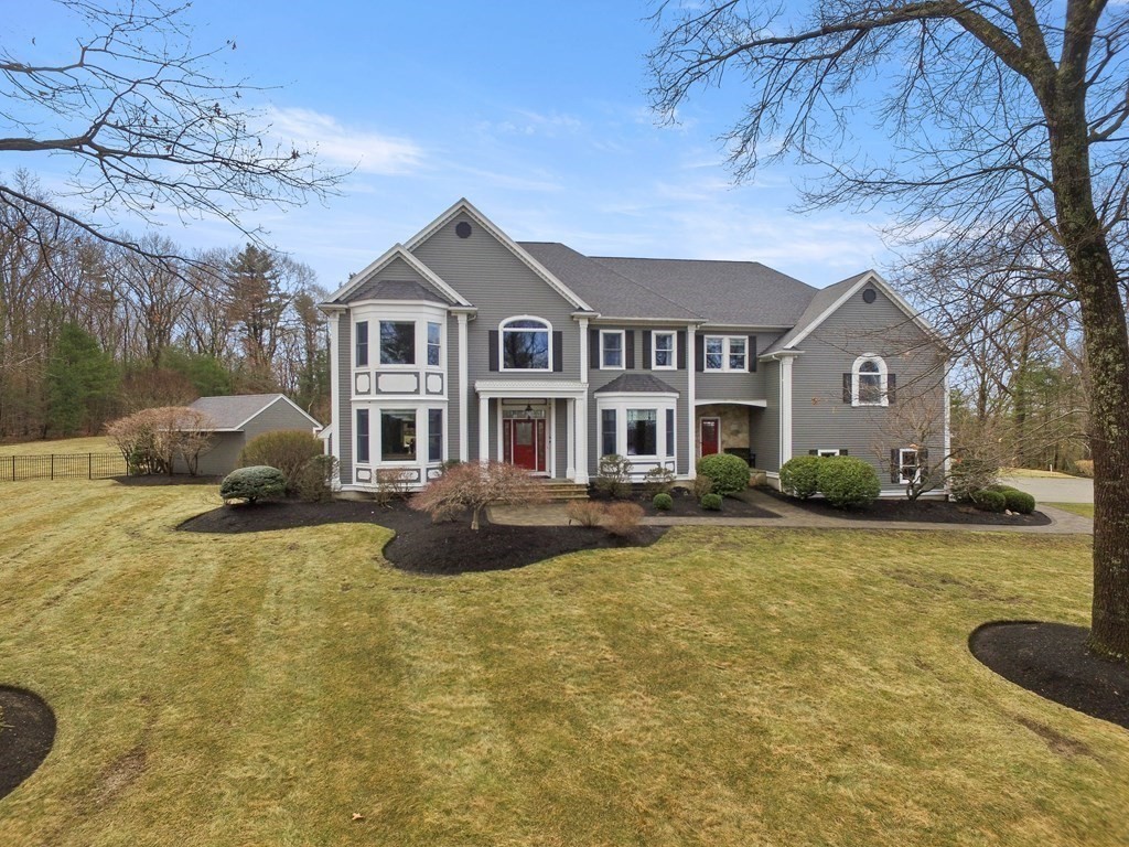 19 A Bayns Hill Road Boxford, MA 01921 - Photo 1 of 41 a front view of a house with yard and green space