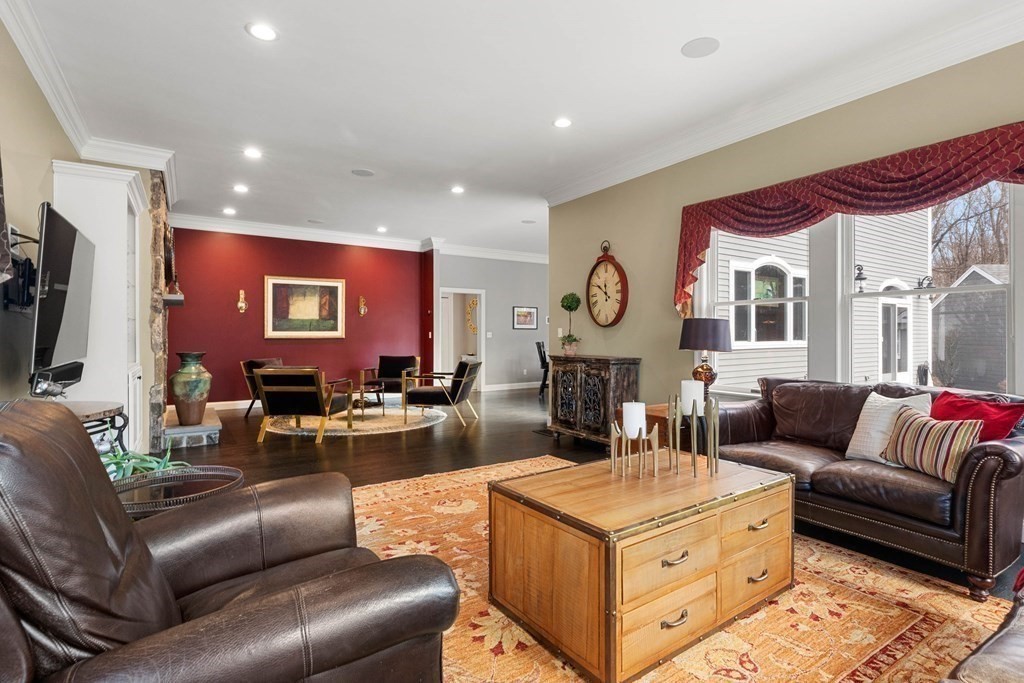 19 A Bayns Hill Road Boxford, MA 01921 - Photo 15 of 41 a living room with furniture and a flat screen tv