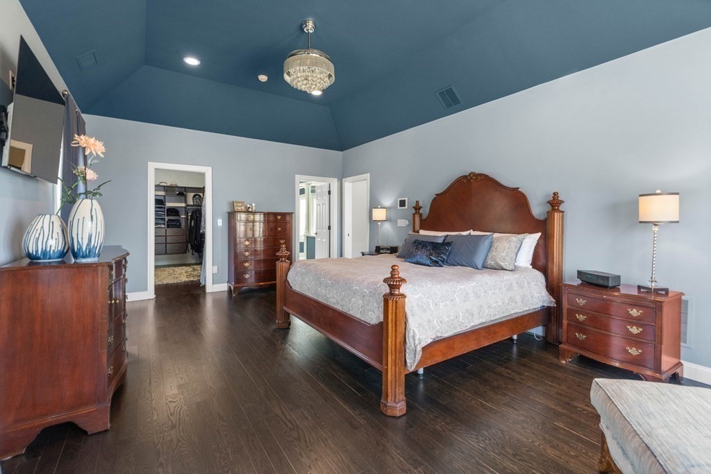 19 A Bayns Hill Road Boxford, MA 01921 - Photo 20 of 41 a bedroom with a bed and wooden floor