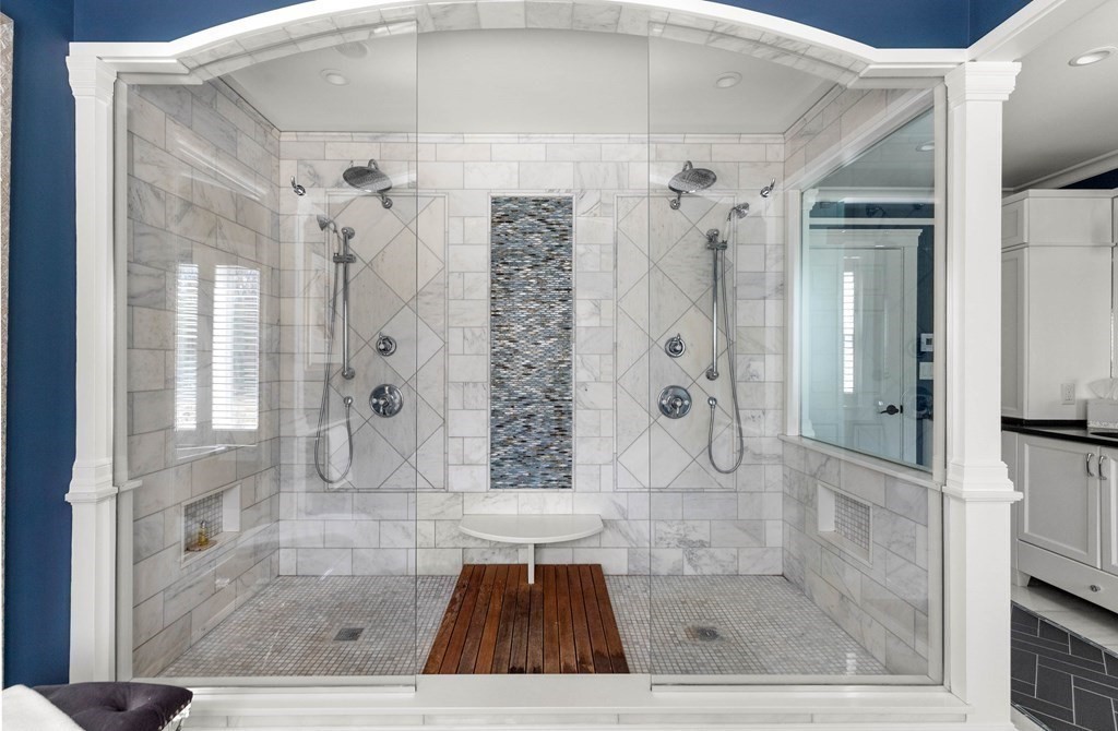 19 A Bayns Hill Road Boxford, MA 01921 - Photo 22 of 41 a bathroom with a glass shower door and a sink