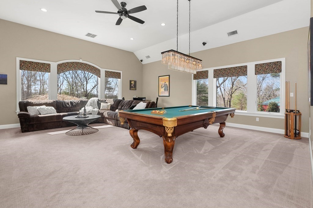 19 A Bayns Hill Road Boxford, MA 01921 - Photo 31 of 41 a living room with furniture a table and a large window
