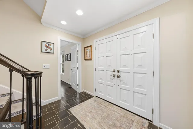 a view of a hallway with closet