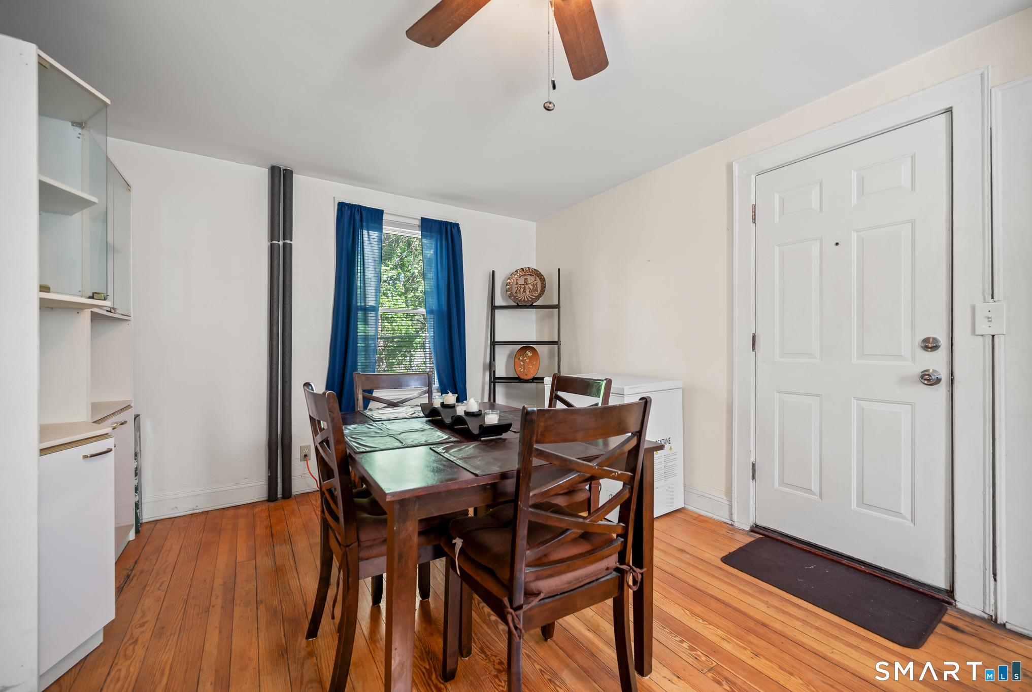 3 Flower Street Middletown, CT 06457 - Photo 5 of 17 a view of a dining room with furniture window and wooden floor