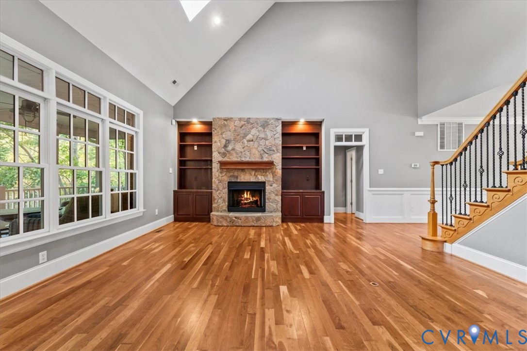 3308 Yarding Way Toano, VA 23168 - Photo 28 of 83 a view of empty room with wooden floor and fireplace