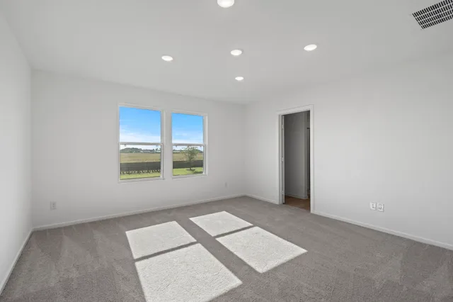 an empty room with windows