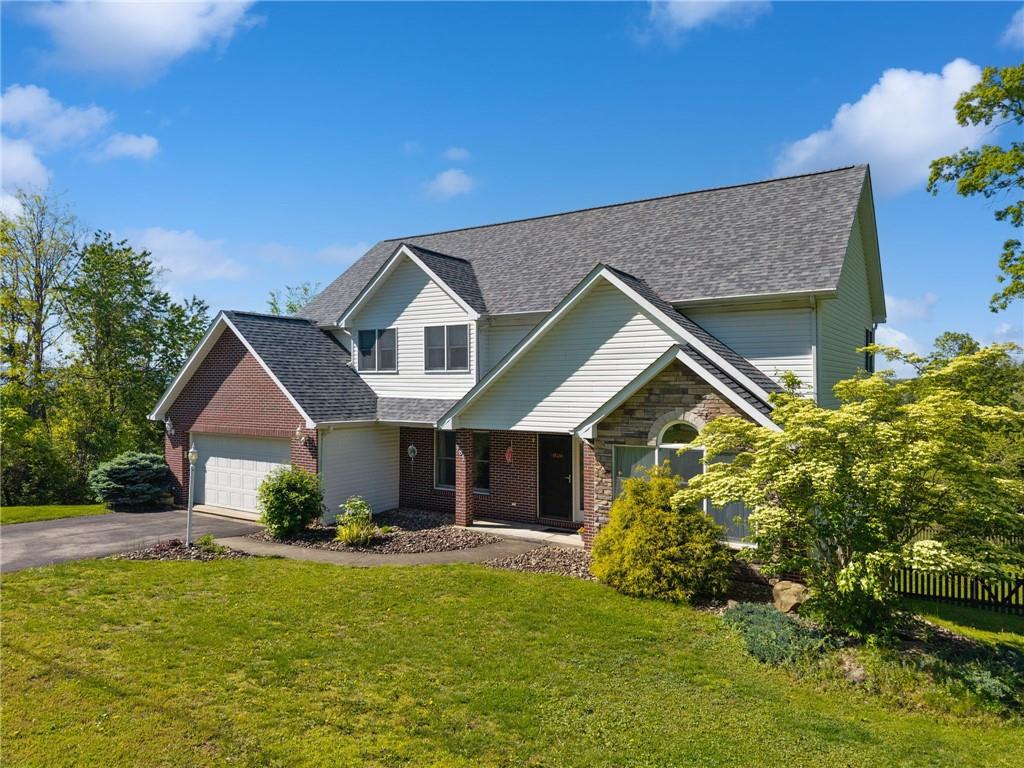 481 Sawmill Road Greensburg, PA 15601 - Photo 1 of 39 a front view of a house with a yard