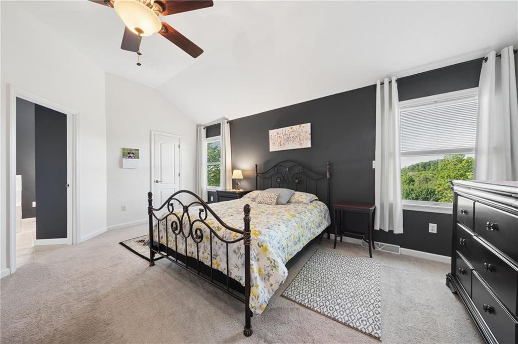 481 Sawmill Road Greensburg, PA 15601 - Photo 19 of 39 a bedroom with a bed lamp and a window
