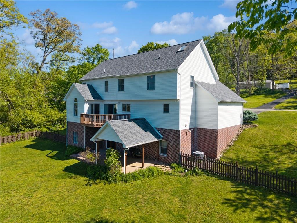 481 Sawmill Road Greensburg, PA 15601 - Photo 35 of 39 a aerial view of a house with swimming pool next to a yard