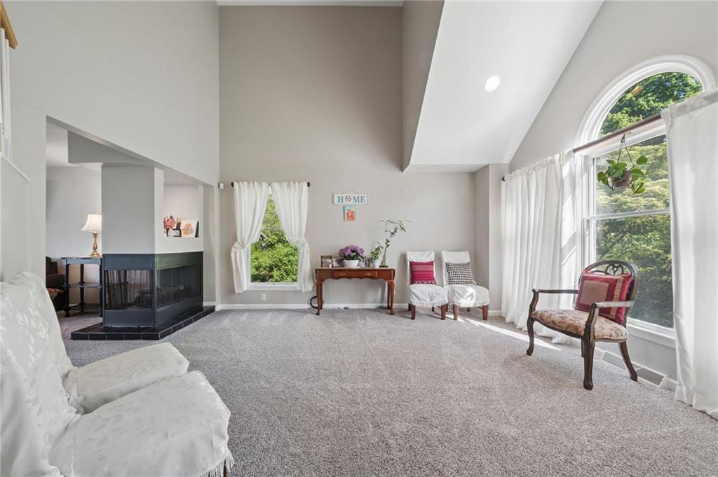 481 Sawmill Road Greensburg, PA 15601 - Photo 5 of 39 a living room with furniture and a flat screen tv