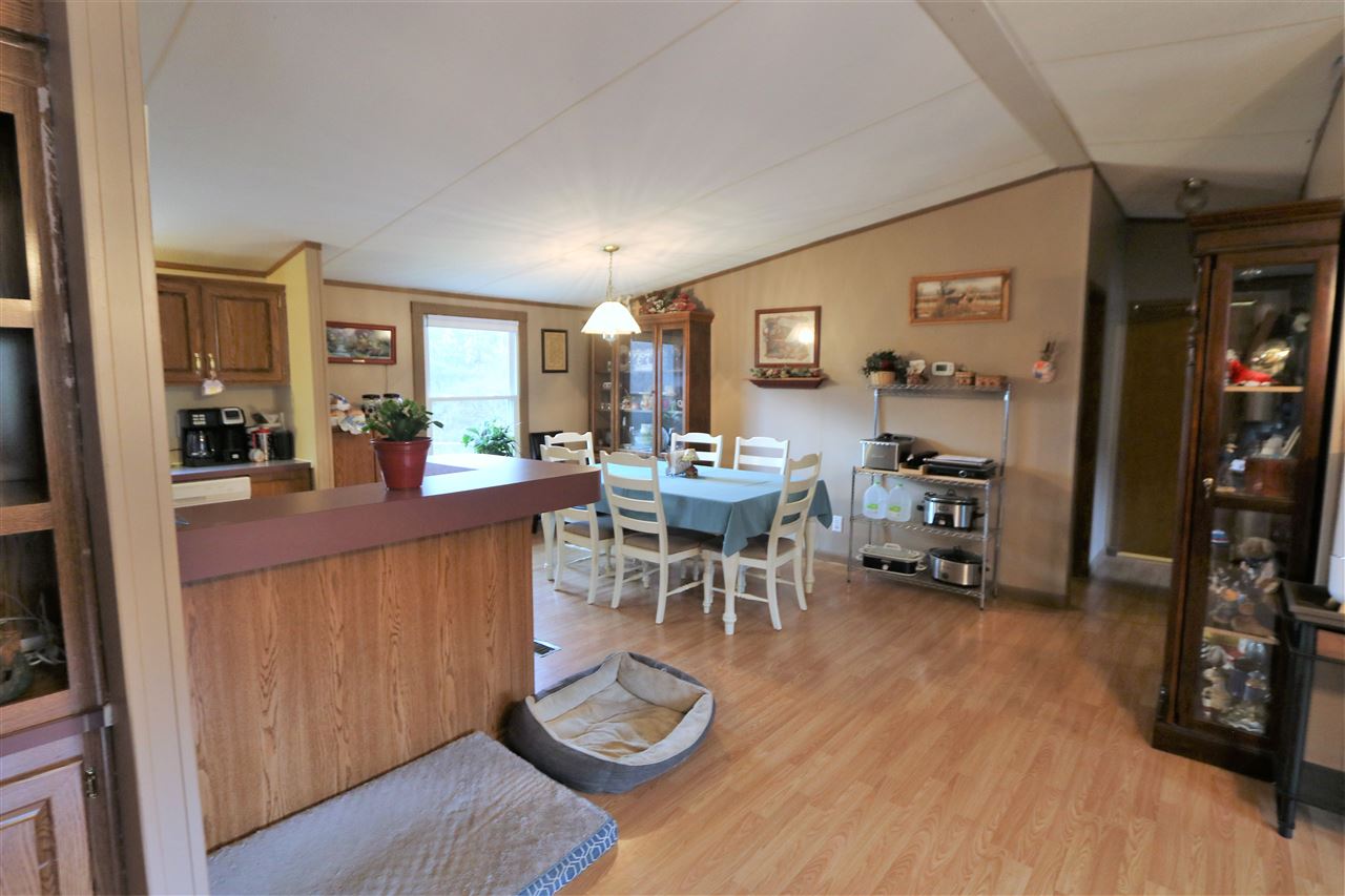 799 Purple Cow Road Waynesboro, VA 22980 - Photo 21 of 31 a living room with furniture a wooden floor and a sink