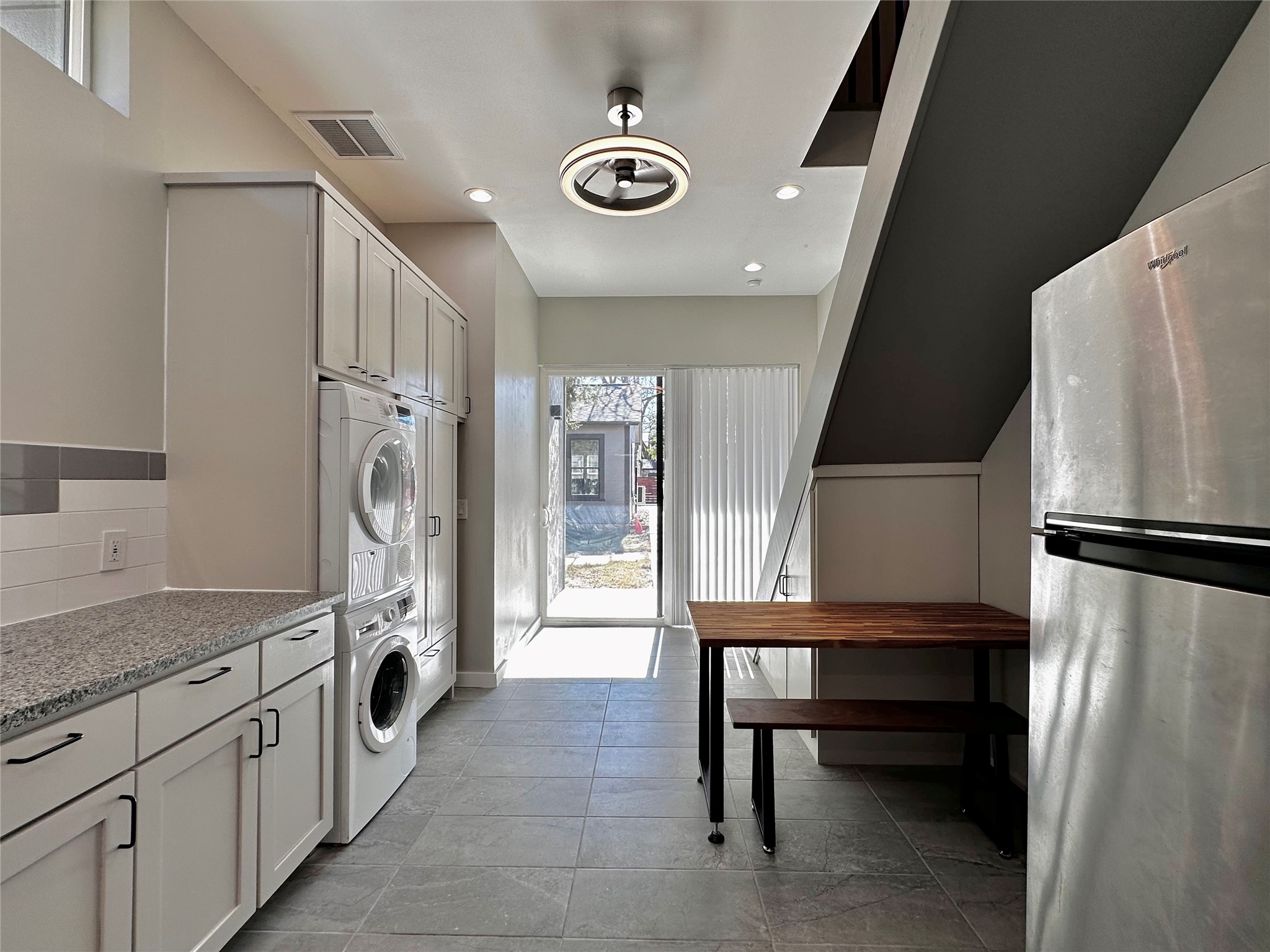 914 East 39th Street, Unit 2 Austin, TX 78751 - Photo 11 of 34 Laundry area featuring stacked washer and dryer, recessed lighting, and ceiling fan