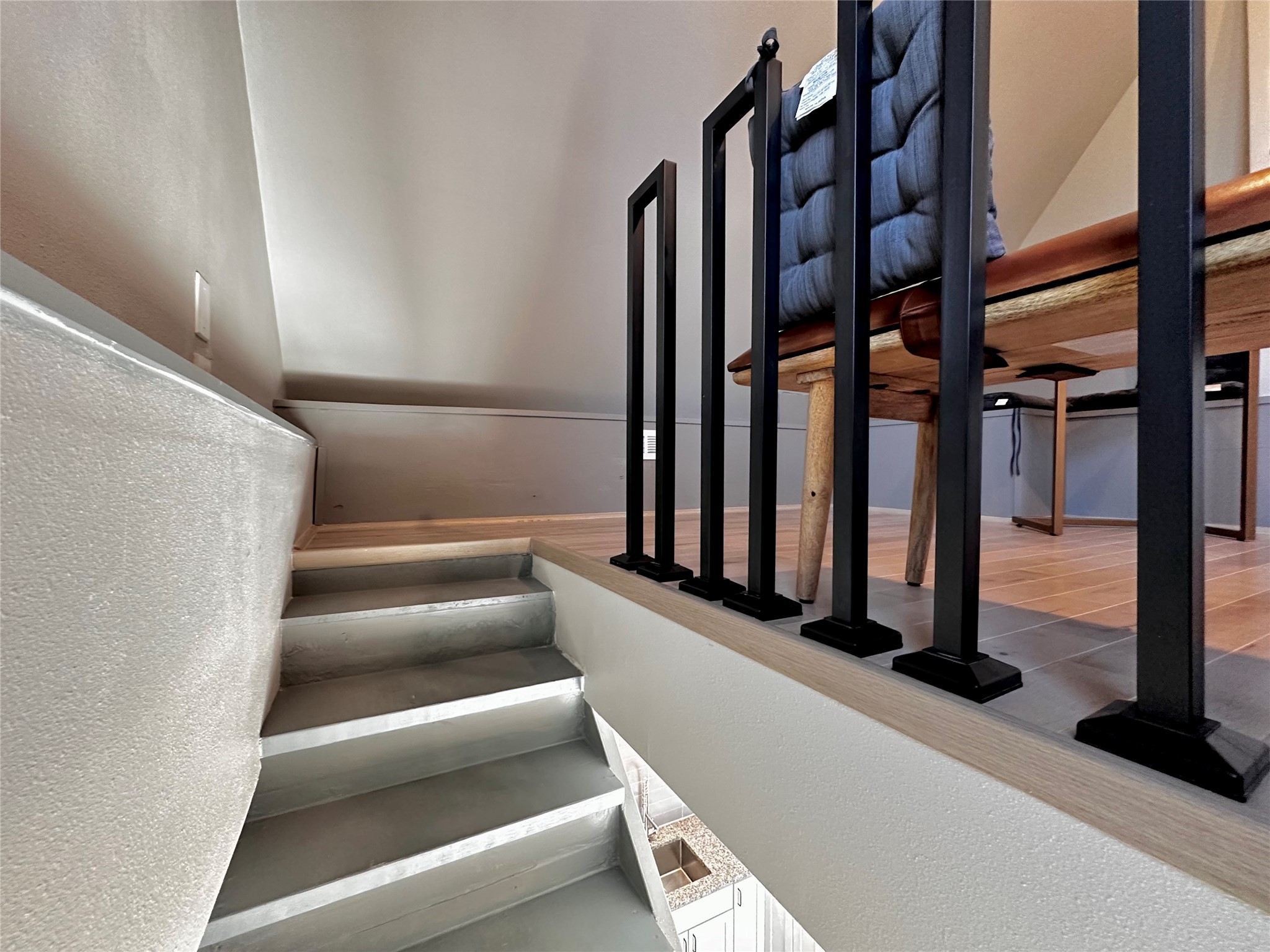 914 East 39th Street, Unit 2 Austin, TX 78751 - Photo 14 of 34 Staircase with wood finished floors