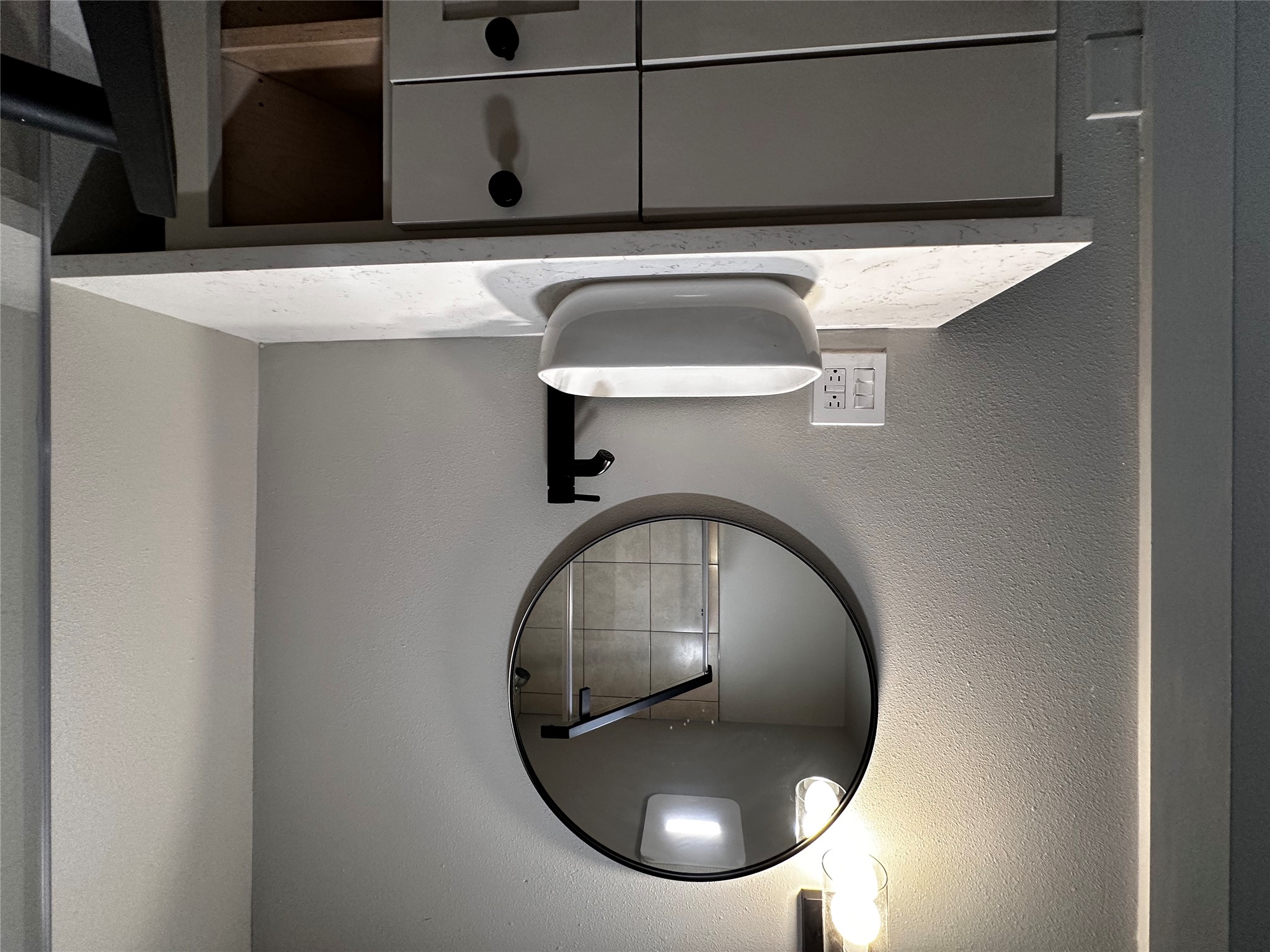 914 East 39th Street, Unit 2 Austin, TX 78751 - Photo 27 of 34 Bathroom featuring a textured wall and vanity