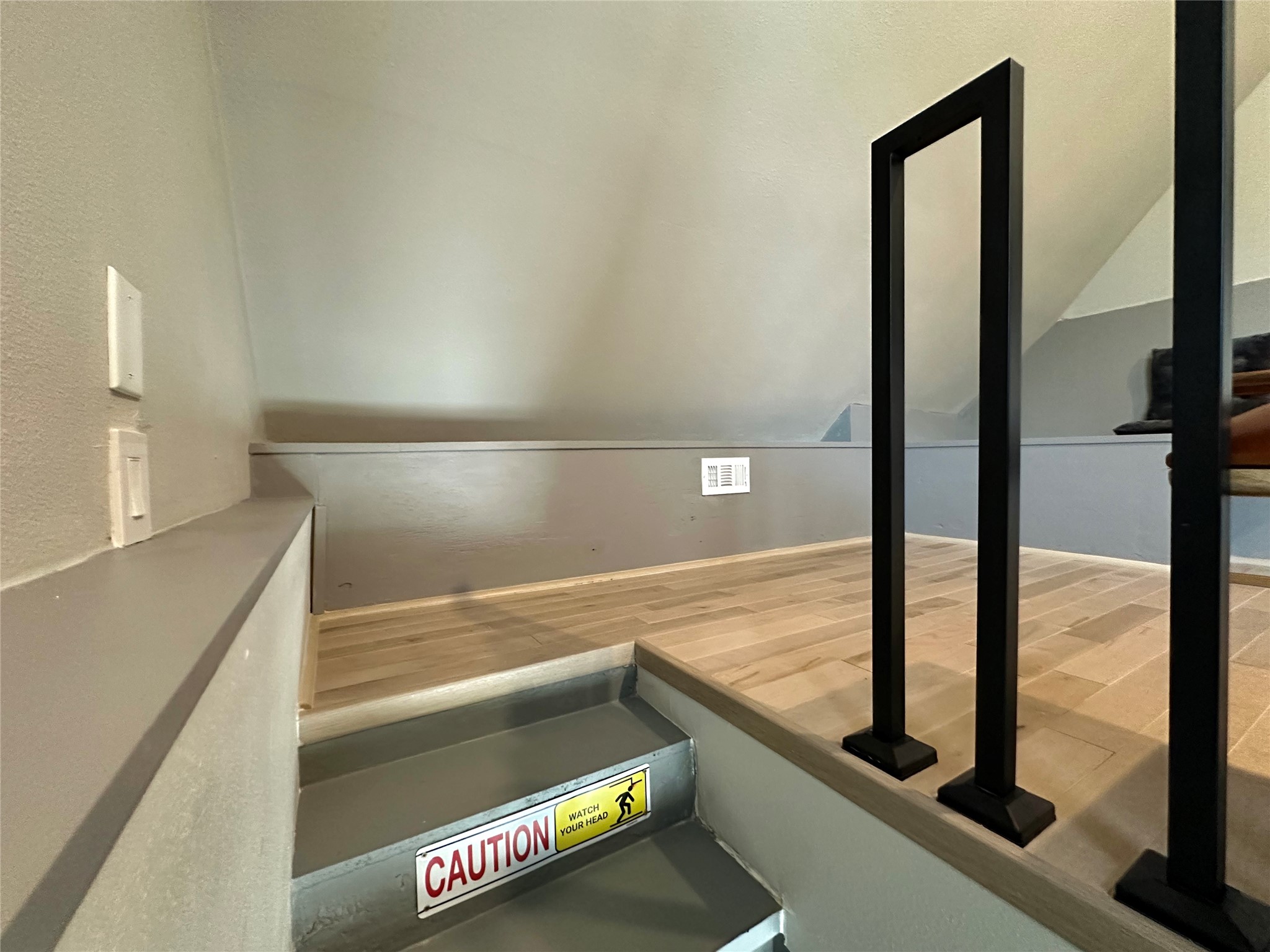 914 East 39th Street, Unit 2 Austin, TX 78751 - Photo 29 of 34 Stairs with wood finished floors