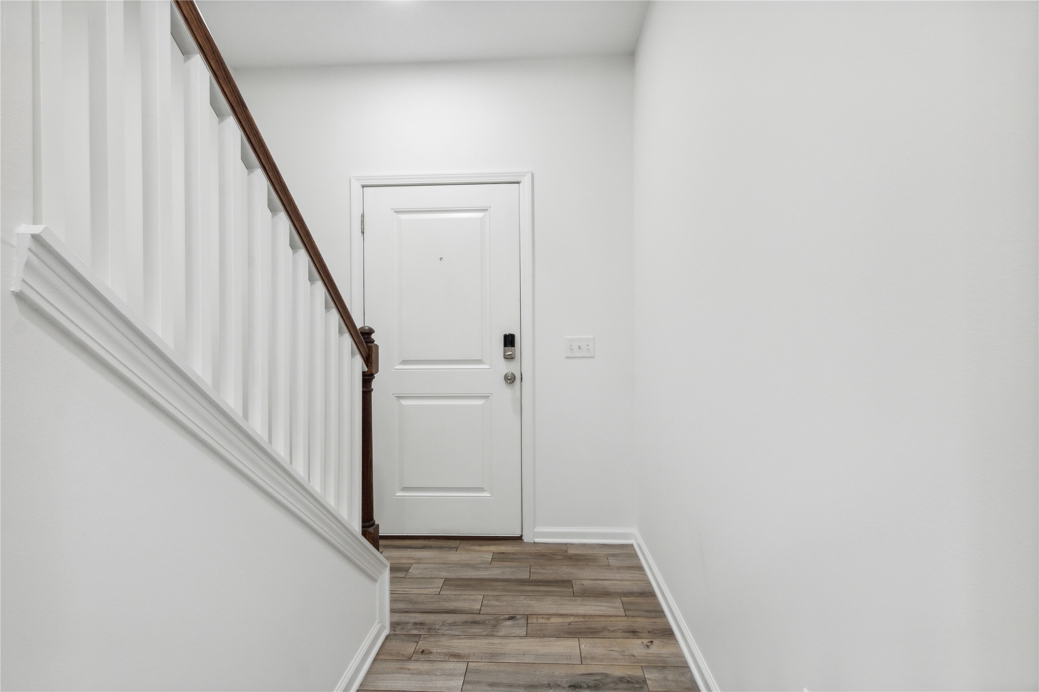 87279 Lents Road Yulee, FL 32097 - Photo 9 of 40 a view of a hallway with staircase