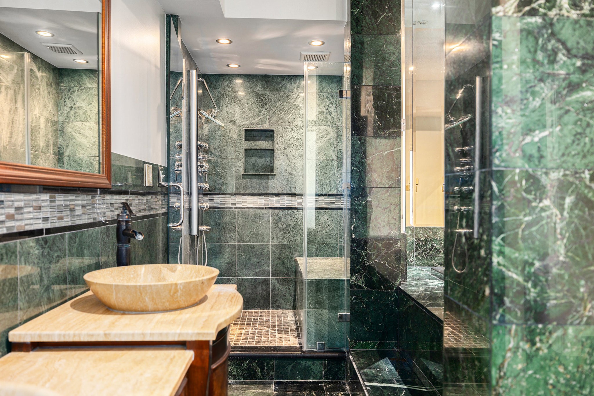 7415 Naremore Drive Spring, TX 77379 - Photo 23 of 47 a bathroom with a sink and a mirror