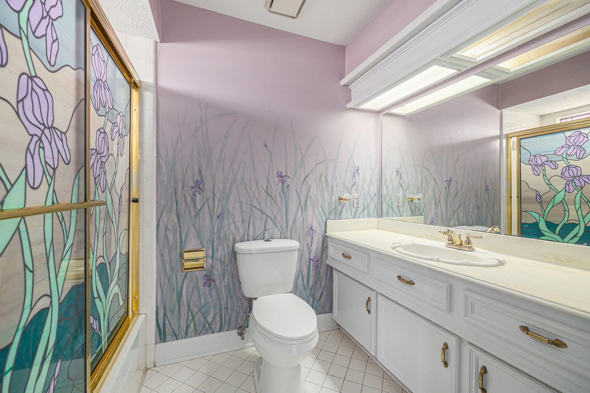 7415 Naremore Drive Spring, TX 77379 - Photo 45 of 47 a bathroom with a toilet sink and mirror