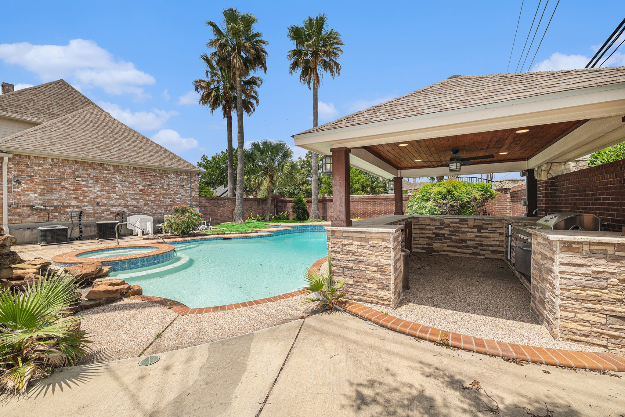 7415 Naremore Drive Spring, TX 77379 - Photo 46 of 47 a view of a backyard with a patio