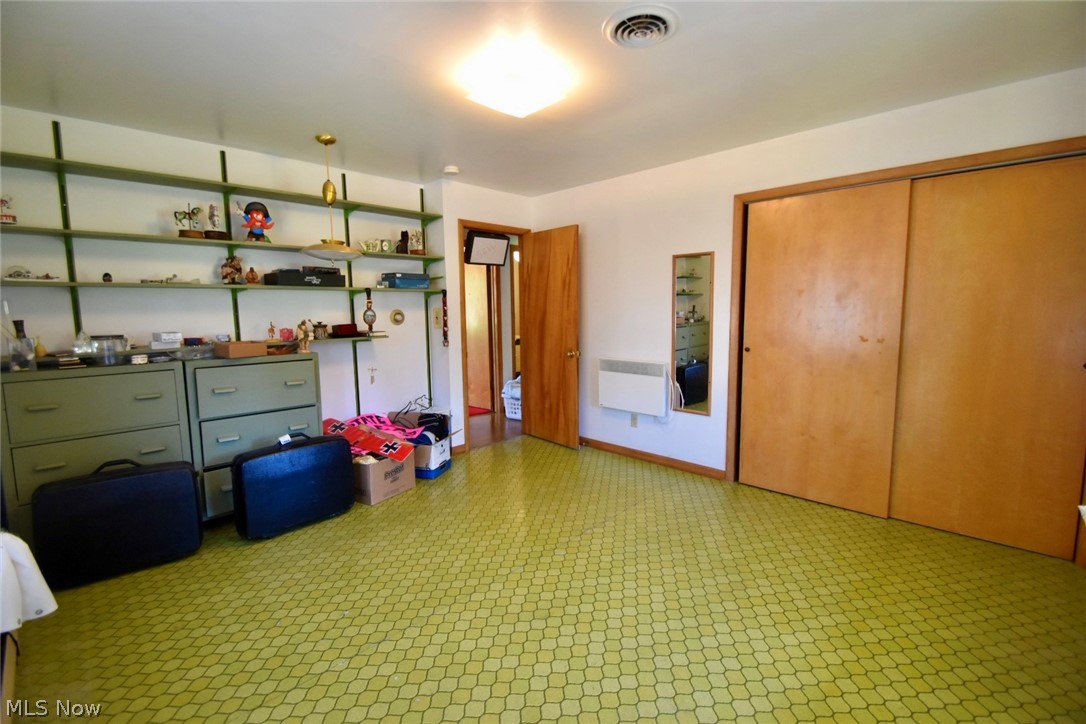 12840 South Reed Road Grafton, OH 44044 - Photo 16 of 27 Garage with radiator heating unit