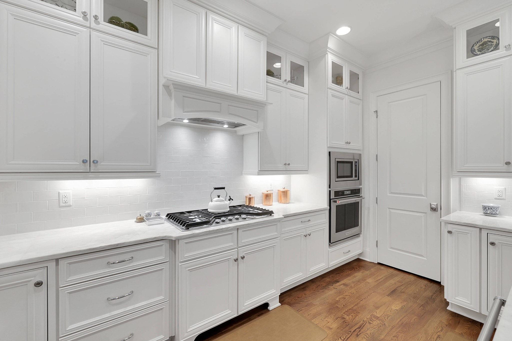 2012 General Martin Lane Franklin, TN 37064 - Photo 18 of 66 a kitchen with white cabinets and appliances