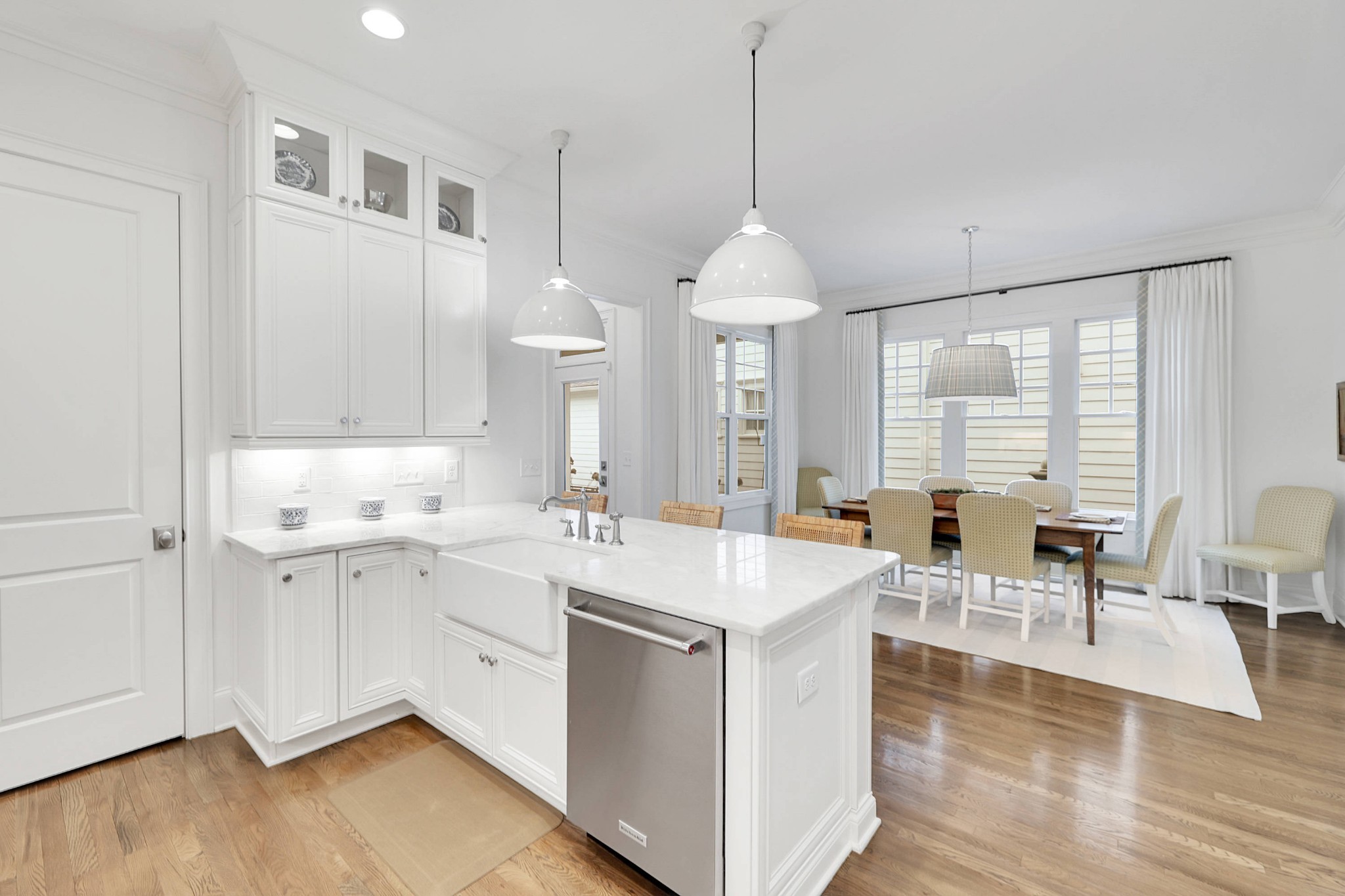 2012 General Martin Lane Franklin, TN 37064 - Photo 22 of 66 a view of center island with wooden floor and furniture