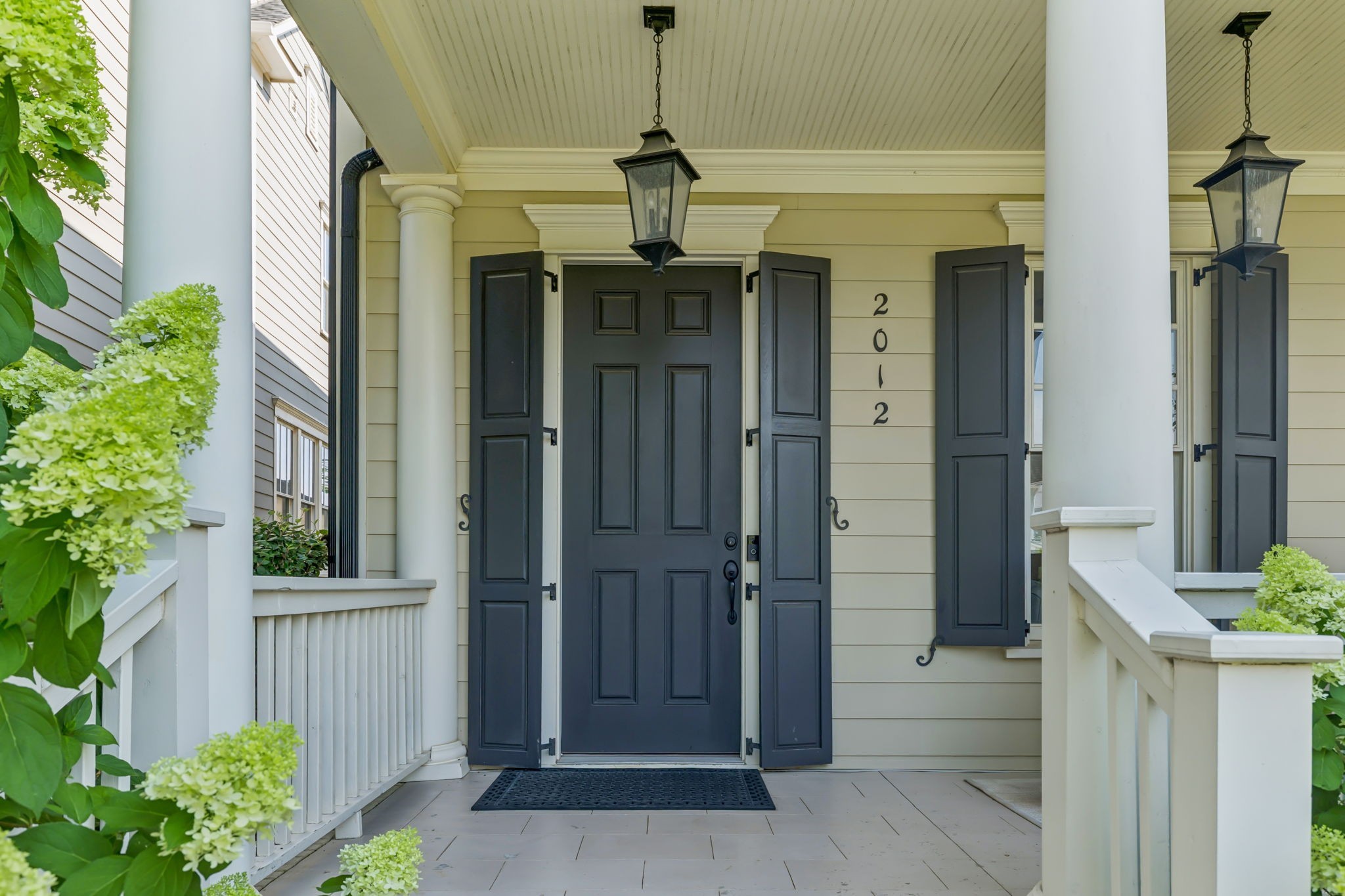 2012 General Martin Lane Franklin, TN 37064 - Photo 3 of 66 a view of a hallway with a door and wooden floor