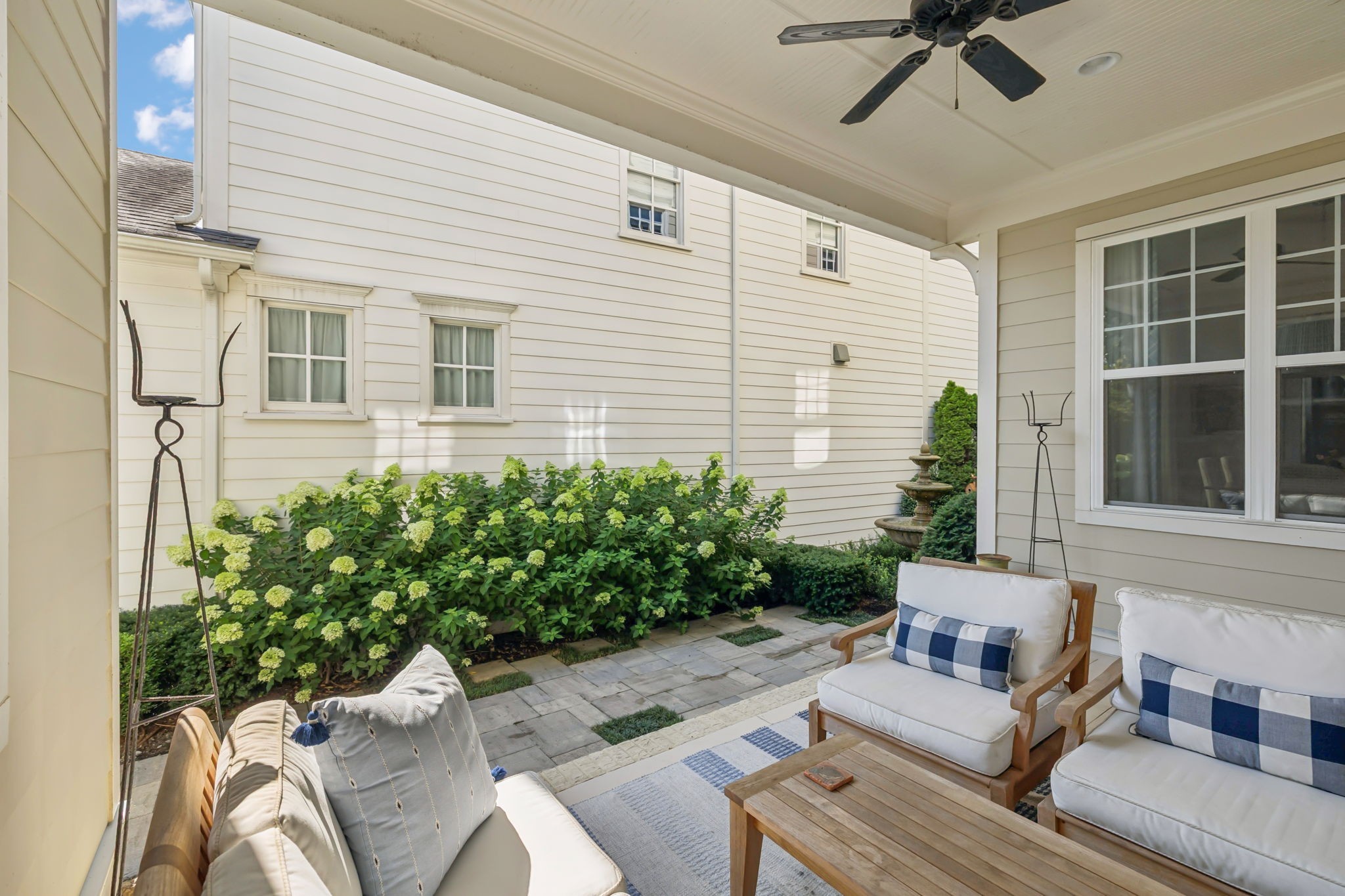 2012 General Martin Lane Franklin, TN 37064 - Photo 51 of 66 a view of a patio with couches table and chairs and potted plants
