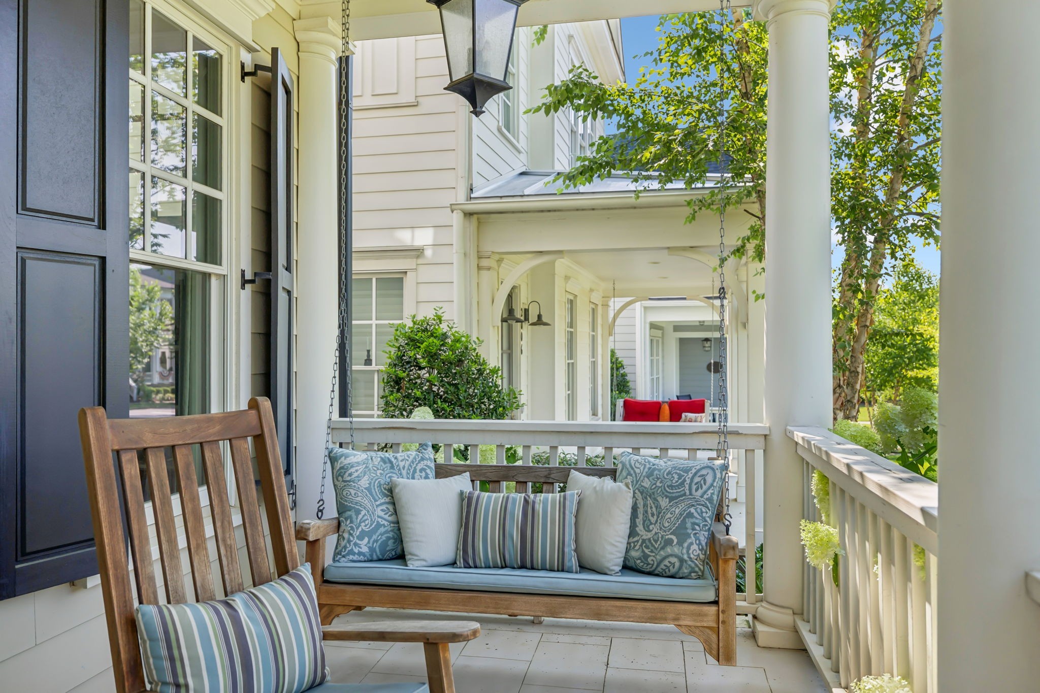 2012 General Martin Lane Franklin, TN 37064 - Photo 6 of 66 a view of a brick house with a chairs and table in a balcony