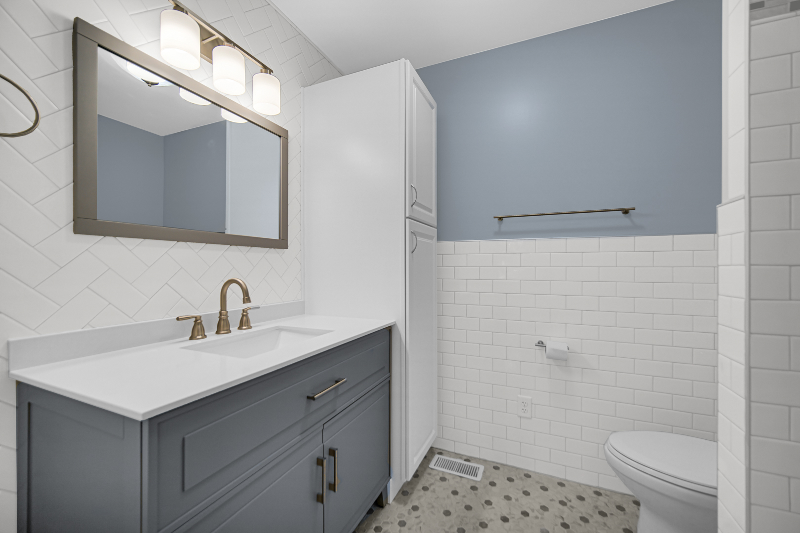 18462 Dixie Highway Homewood, IL 60430 - Photo 18 of 25 a bathroom with a sink a toilet and shower