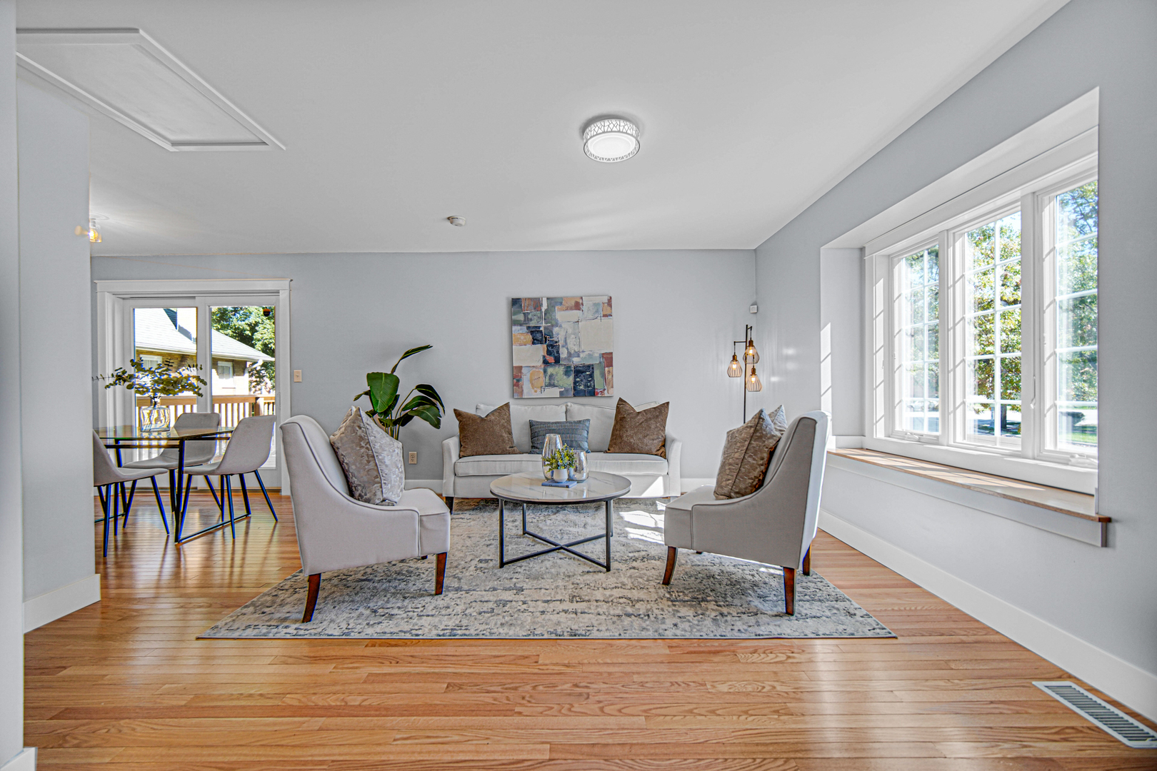 18462 Dixie Highway Homewood, IL 60430 - Photo 6 of 25 a living room with furniture and a wooden floor