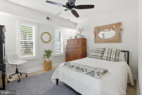 a bedroom with a bed and furniture