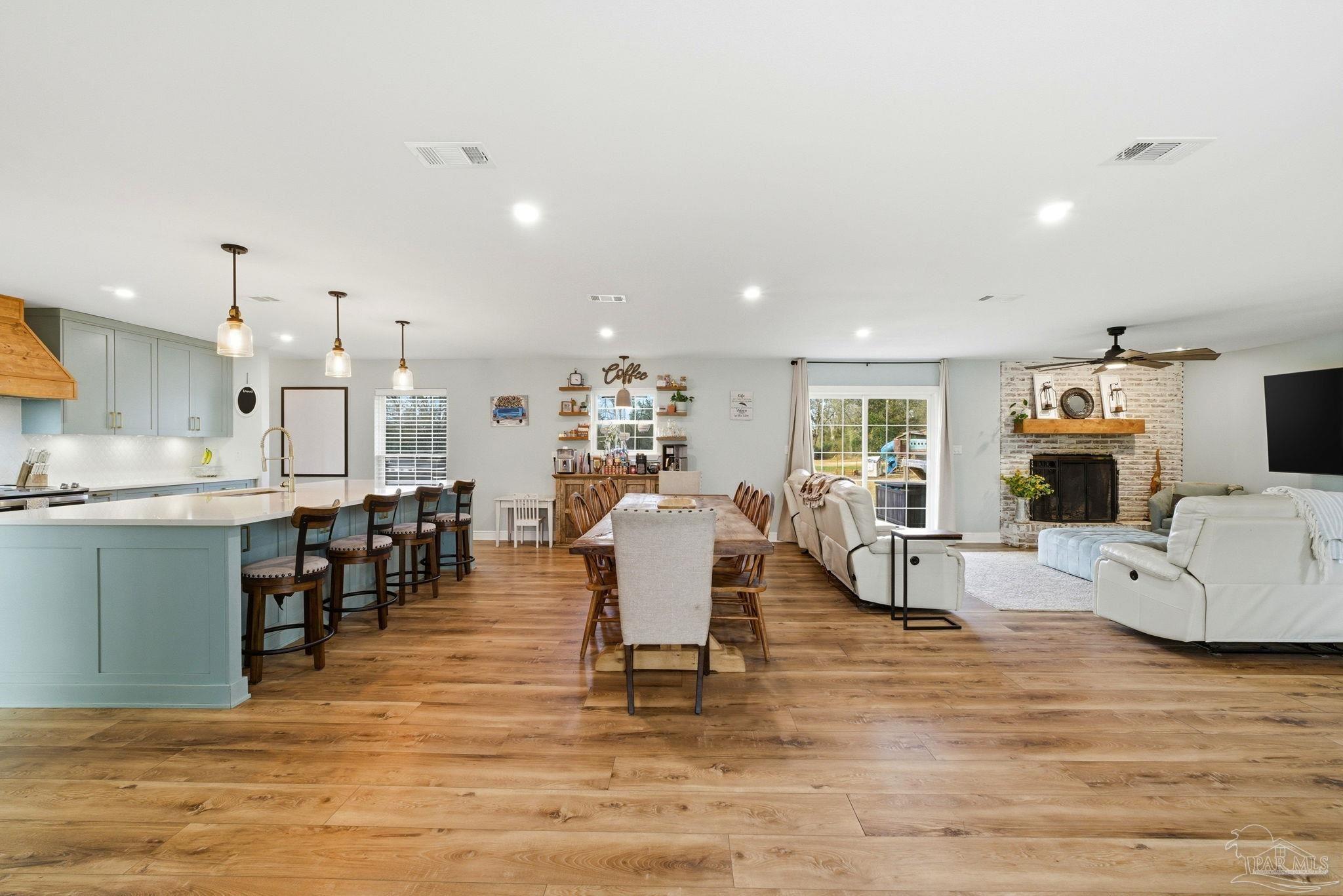 690 Cooley Road Cantonment, FL 32533 - Photo 17 of 64 a living room with furniture and kitchen view