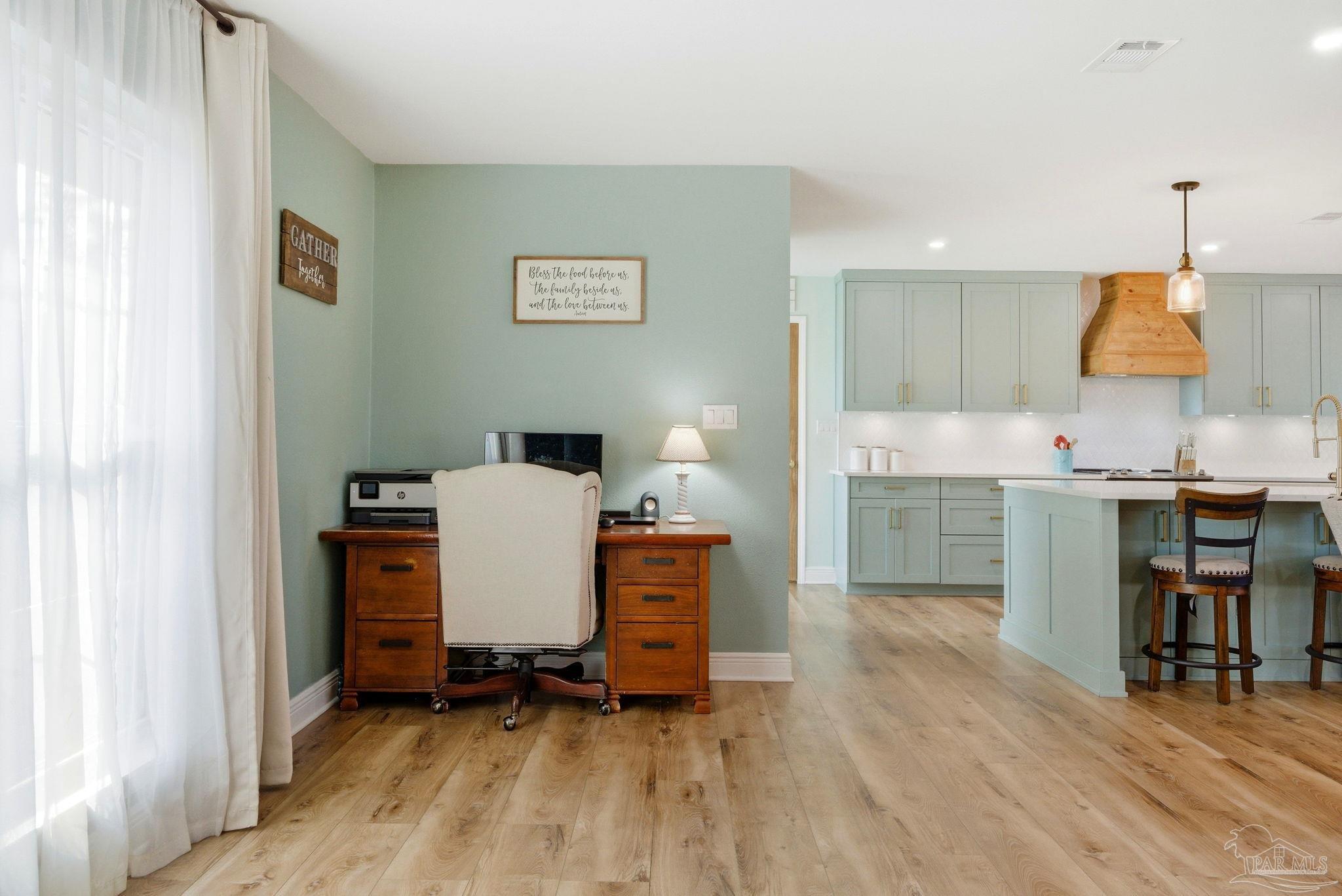 690 Cooley Road Cantonment, FL 32533 - Photo 20 of 64 a view of kitchen with furniture and wooden floor