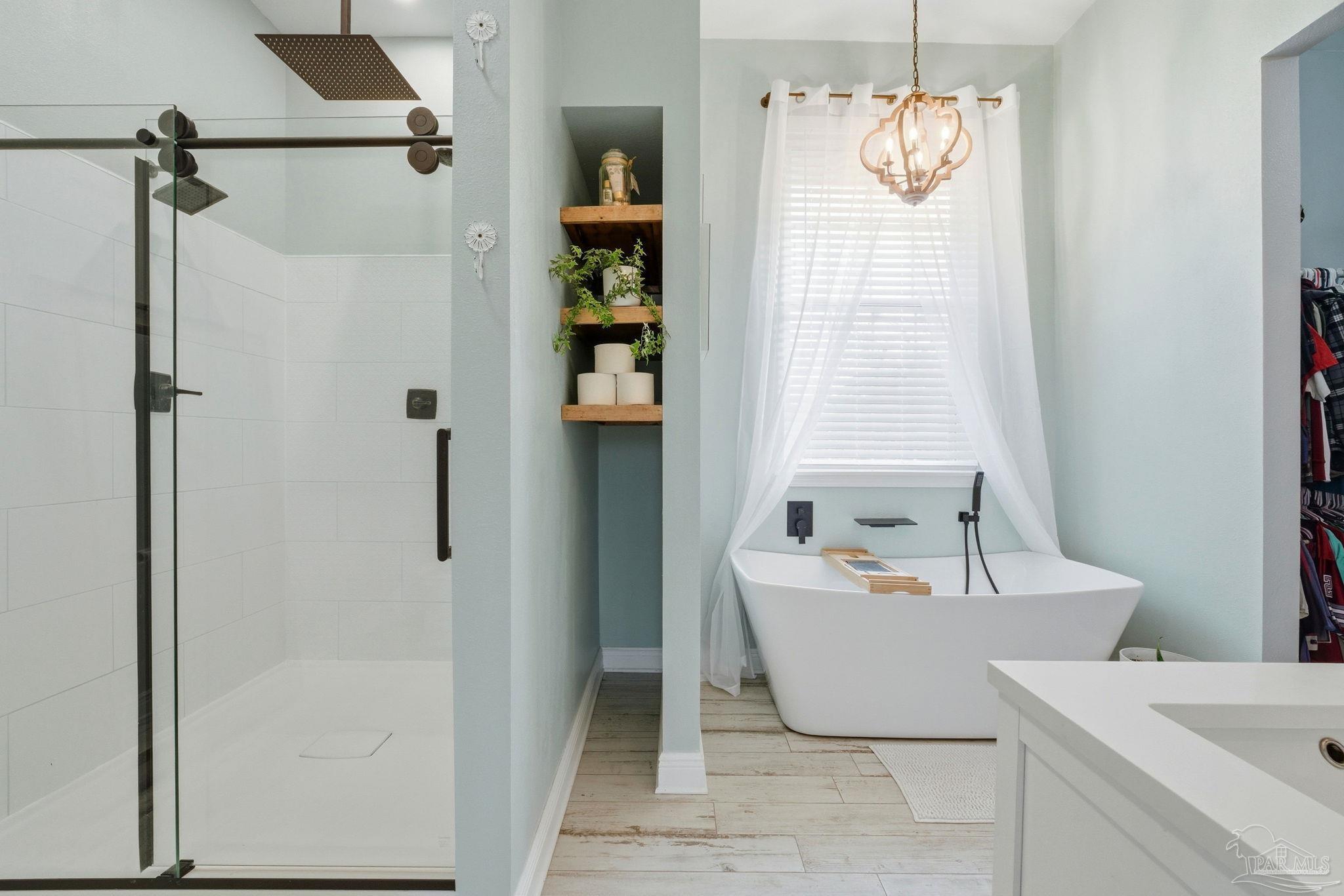690 Cooley Road Cantonment, FL 32533 - Photo 25 of 64 a bathroom with a bathtub and shower