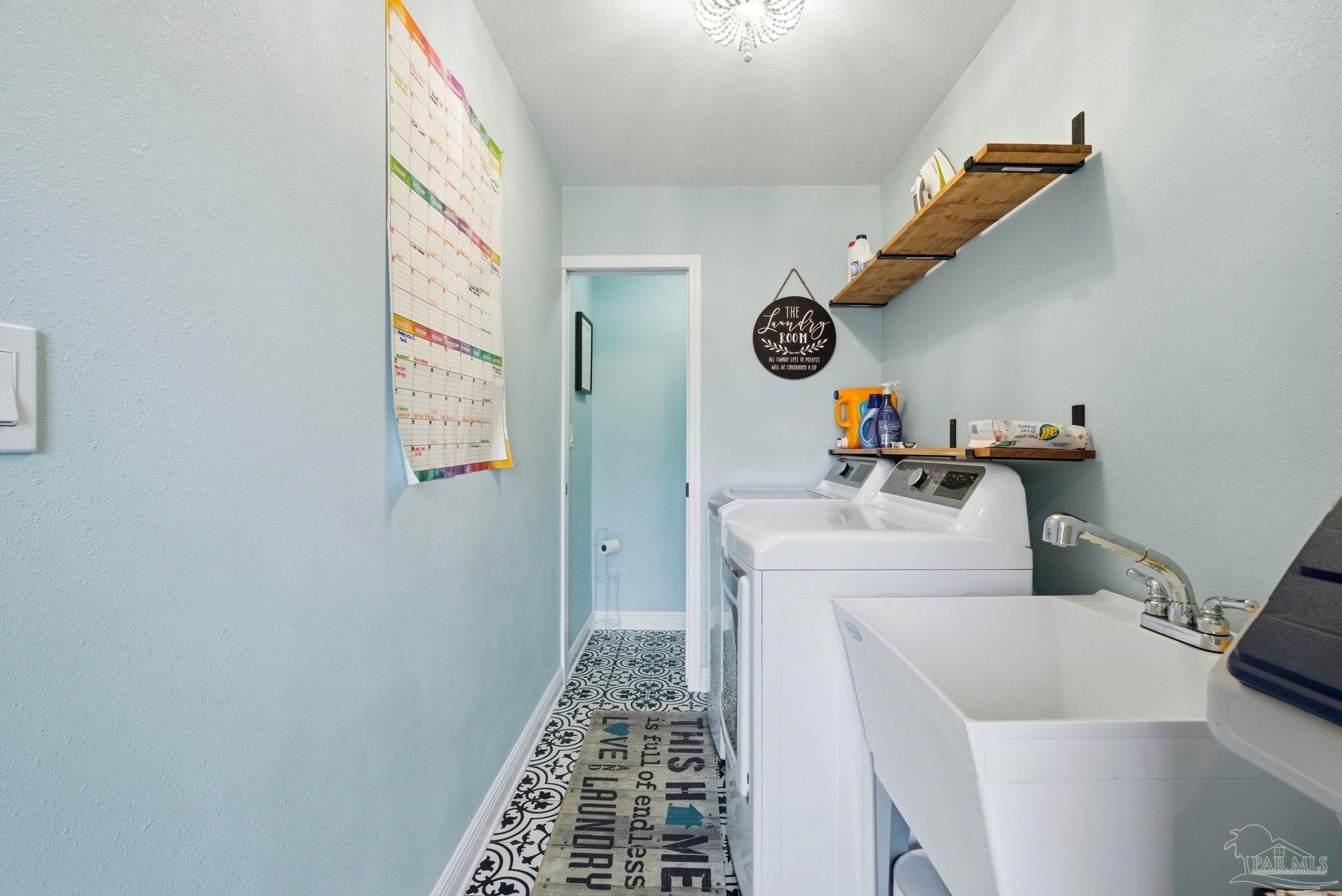 690 Cooley Road Cantonment, FL 32533 - Photo 39 of 64 a utility room with dryer and washer